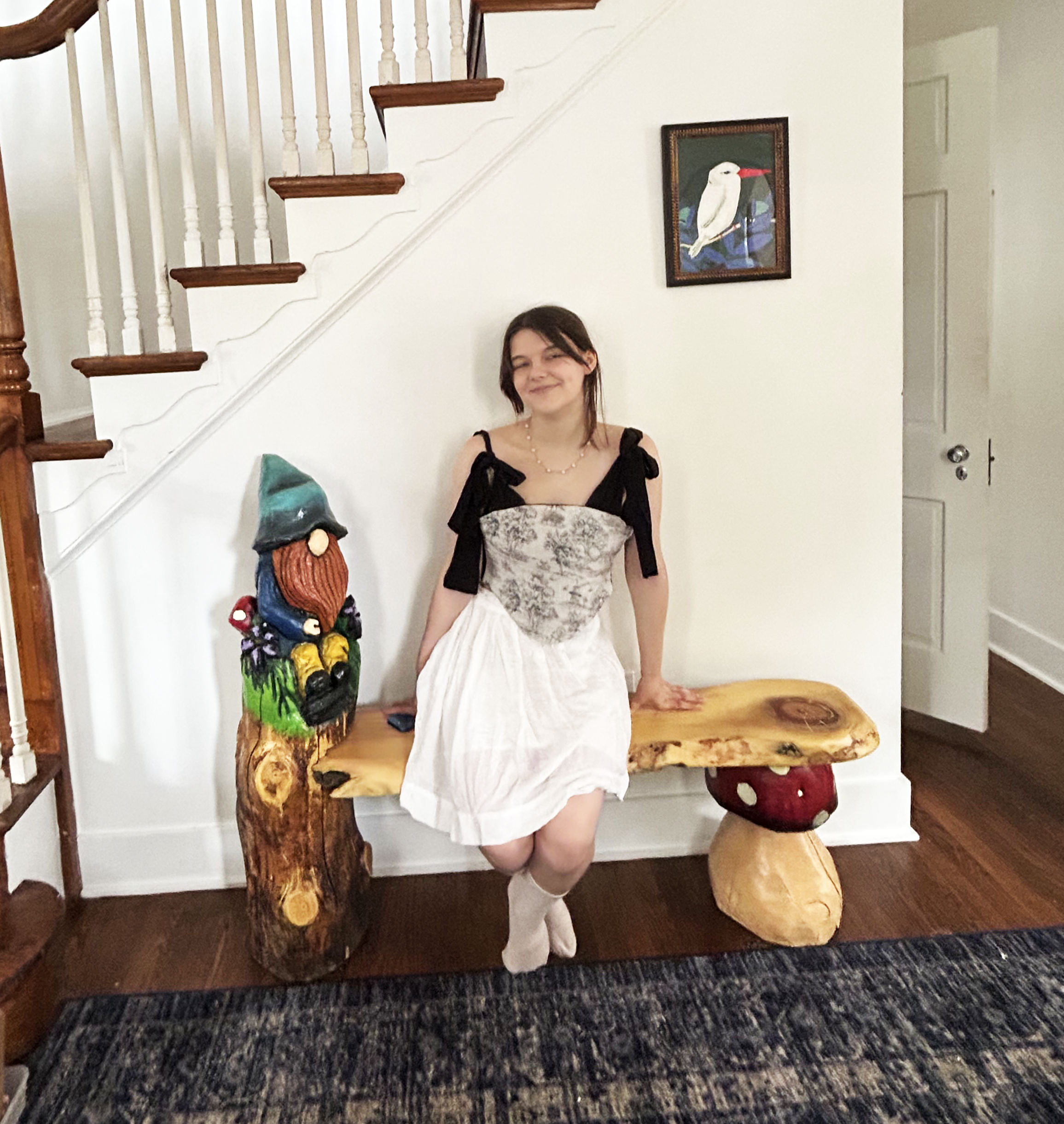 My niece Ash with a gnome bench I carved